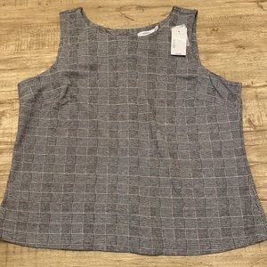 Ricki’s business tank top, size XL.